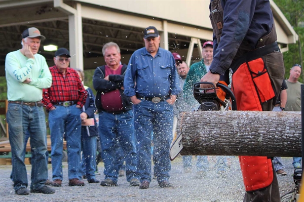 Logging experts demonstrate chainsaw safety at Farm Bureau event