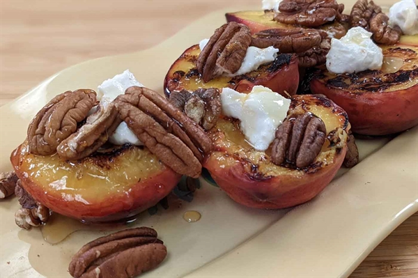 Grilled Peaches with Goat Cheese, Toasted Pecans, Honey and Mint