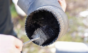 Schedule annual chimney sweep and inspection ahead of heating season