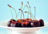 Chocolate-coated Maraschino Cherries Sprinkled with Macadamia Nuts