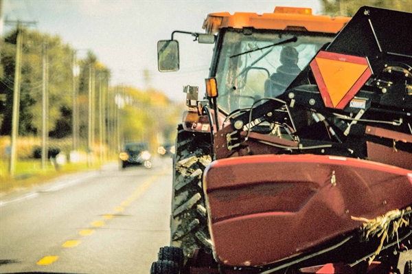 Share the road safely with farmers during busy hay season