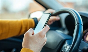 Virginia motorists adjusting to hand-held phone ban