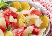 Citrus fruit salad with honey mint lime syrup